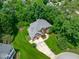 Stunning aerial view showcasing the home's architecture, landscaping, and inviting curb appeal at 102 Lions Mouth Ct, Cary, NC 27518