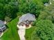 Beautiful aerial view of the home surrounded by lush greenery and well-manicured landscaping at 102 Lions Mouth Ct, Cary, NC 27518