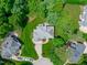 Overhead view of the home with a spacious backyard and proximity to other homes in the neighborhood at 102 Lions Mouth Ct, Cary, NC 27518