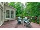 Inviting deck with outdoor seating and views of the lush greenery at 102 Lions Mouth Ct, Cary, NC 27518