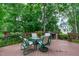 Inviting deck with outdoor seating and views of the lush greenery at 102 Lions Mouth Ct, Cary, NC 27518