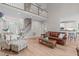 Open concept living room with staircase and access to the kitchen at 102 Lions Mouth Ct, Cary, NC 27518