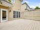 A spacious deck is perfect for outdoor entertaining, featuring white wood and lattice panels at 102 Westside Dr, Chapel Hill, NC 27516