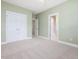 Bedroom with neutral carpet and a closet at 102 Westside Dr, Chapel Hill, NC 27516