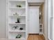 This bedroom features stylish built-in shelving and a convenient Murphy bed, maximizing space and functionality at 102 Westside Dr, Chapel Hill, NC 27516
