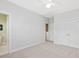 Bedroom with carpet, closet, and doorways at 102 Westside Dr, Chapel Hill, NC 27516