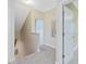 Hallway with doorways, carpet, stairs, and picture on the wall at 102 Westside Dr, Chapel Hill, NC 27516