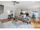 Comfortable living room showcasing an open floor plan and seamless transition into the kitchen and dining spaces at 102 Westside Dr, Chapel Hill, NC 27516