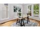 Stylish home office with natural light, hardwood floors, and a neutral color palette at 102 Westside Dr, Chapel Hill, NC 27516