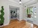 Bright office space with French doors, hardwood floors, and view of the front porch at 102 Westside Dr, Chapel Hill, NC 27516