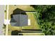 An aerial view of the home featuring the fenced backyard and asphalt roof at 1028 Gallivant Way, Wake Forest, NC 27587