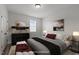 Bedroom featuring neutral tones, a comfy bed, and stylish furnishings at 1028 Gallivant Way, Wake Forest, NC 27587