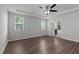Bright, spacious bedroom with two large windows and tray ceiling featuring an ensuite bathroom at 1028 Gallivant Way, Wake Forest, NC 27587