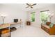 Bright bedroom with natural light, a desk area, and comfortable seating for relaxation at 103 Chapelwood Way, Cary, NC 27518