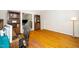Spacious office with hardwood floors, built-in shelves, and plenty of natural light at 103 Chapelwood Way, Cary, NC 27518
