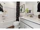 Clean bathroom with a tub, shower, contemporary finishes, and stylish decorative touches at 10518 Pleasant Branch Dr # 33, Raleigh, NC 27614
