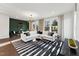 Spacious living room with a comfortable sectional sofa, stylish decor, and plenty of natural light at 10518 Pleasant Branch Dr # 33, Raleigh, NC 27614