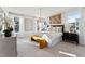 Serene main bedroom with large windows, neutral tones, and elegant chandelier lighting at 10518 Pleasant Branch Dr # 33, Raleigh, NC 27614