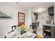 Dining area connects seamlessly with a stylish and updated kitchen at 109 Davidson Ave, Durham, NC 27704