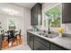 Updated kitchen with stone countertops and eat-in dining area at 109 Davidson Ave, Durham, NC 27704