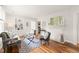 Bright living room featuring hardwood floors, fireplace and neutral paint at 109 Davidson Ave, Durham, NC 27704