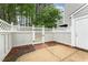 Cozy backyard featuring a brick patio, privacy fence, and gated access to enjoy outdoor living at 113 Spring Cove Dr, Cary, NC 27511