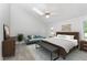 Stylishly furnished main bedroom with a comfortable bed, seating, and decor, creating a relaxing retreat at 113 Spring Cove Dr, Cary, NC 27511