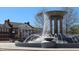 View of local Carhartt Center building on public square with prominent fountain in foreground at 113 Spring Cove Dr, Cary, NC 27511