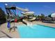 A large waterslide at the community pool offers fun and recreation for residents and families at 124 Creekvista Dr, Holly Springs, NC 27540