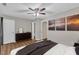 This bedroom boasts wood floors, neutral walls, closet, and an ensuite bathroom for convenience at 134 Riverwalk Cir, Cary, NC 27511