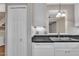 Kitchen sink and dishwasher with view into the living room at 134 Riverwalk Cir, Cary, NC 27511