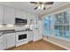 Bright kitchen with modern appliances and white cabinetry, perfect for cooking and entertaining at 134 Riverwalk Cir, Cary, NC 27511