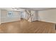 Open-concept living room with hardwood floors and ample space for furniture and decor at 134 Riverwalk Cir, Cary, NC 27511