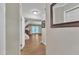 View from entry hallway of open concept living room and staircase at 134 Riverwalk Cir, Cary, NC 27511