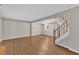 Spacious living room with hardwood floors and natural light, perfect for relaxing or entertaining guests at 134 Riverwalk Cir, Cary, NC 27511