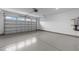 Spacious two car garage with an epoxy floor and white walls at 143 Swain St, Clayton, NC 27527