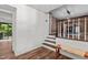 Inviting entryway with a bench seat, staircase, and natural light from the front door at 1503 Laughridge Dr, Cary, NC 27511