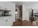 Charming kitchen featuring granite countertops, wood flooring, and stainless steel appliances at 1503 Laughridge Dr, Cary, NC 27511