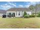 Large backyard with patio and lush landscaping at 1528 Anthology Dr, Durham, NC 27703