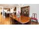 Elegant dining room with hardwood floors, a chandelier, and traditional furniture at 1528 Anthology Dr, Durham, NC 27703