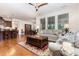 Inviting living room with hardwood floors, comfortable seating, and an open floor plan at 1528 Anthology Dr, Durham, NC 27703