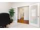 Office space with view to hallway featuring light walls and plush carpet at 1528 Anthology Dr, Durham, NC 27703