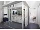 Large bathroom with dual vanities, generous counter space, and a view into the bedroom at 1604 Pinecrest Rd, Durham, NC 27705