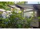 Exterior showcasing the architectural design and landscaping of the home with the foliage providing a lush background at 1604 Pinecrest Rd, Durham, NC 27705