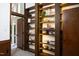 Living room featuring built-in shelving and lots of natural light at 1604 Pinecrest Rd, Durham, NC 27705