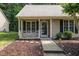 Charming home exterior with front porch, number 17, and neatly maintained landscaping at 17 Crystal Oaks Ct, Durham, NC 27707