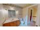 Floral bathroom features a shower/tub and a single sink vanity at 20 Banbury Ct, Roxboro, NC 27573