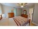 Spacious bedroom features a comfy bed, dressers and neutral carpet at 20 Banbury Ct, Roxboro, NC 27573