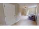 Carpeted bonus room with neutral walls, closet and comfortable plaid couch at 20 Banbury Ct, Roxboro, NC 27573