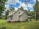 Charming two-story home with vinyl siding and a well-maintained lawn at 20 Banbury Ct, Roxboro, NC 27573